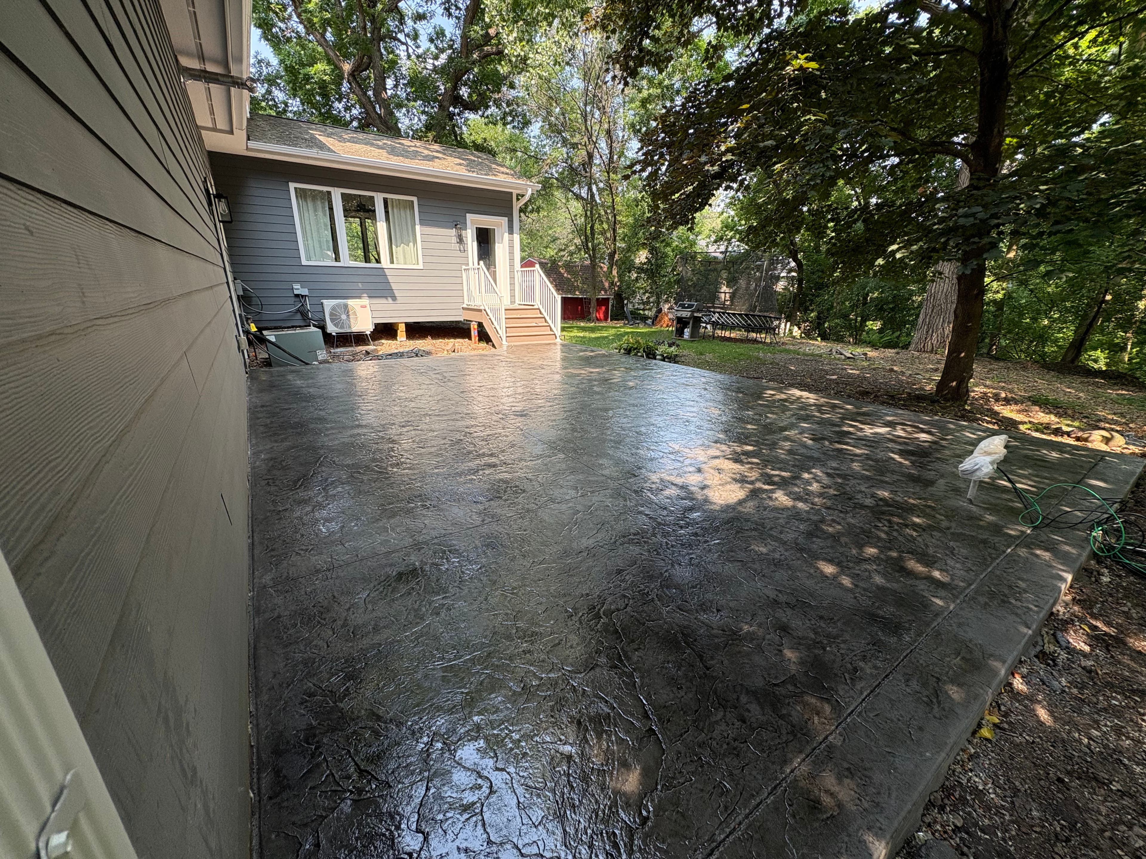 Project Stamped and Stained Concrete Patio for Hutub image