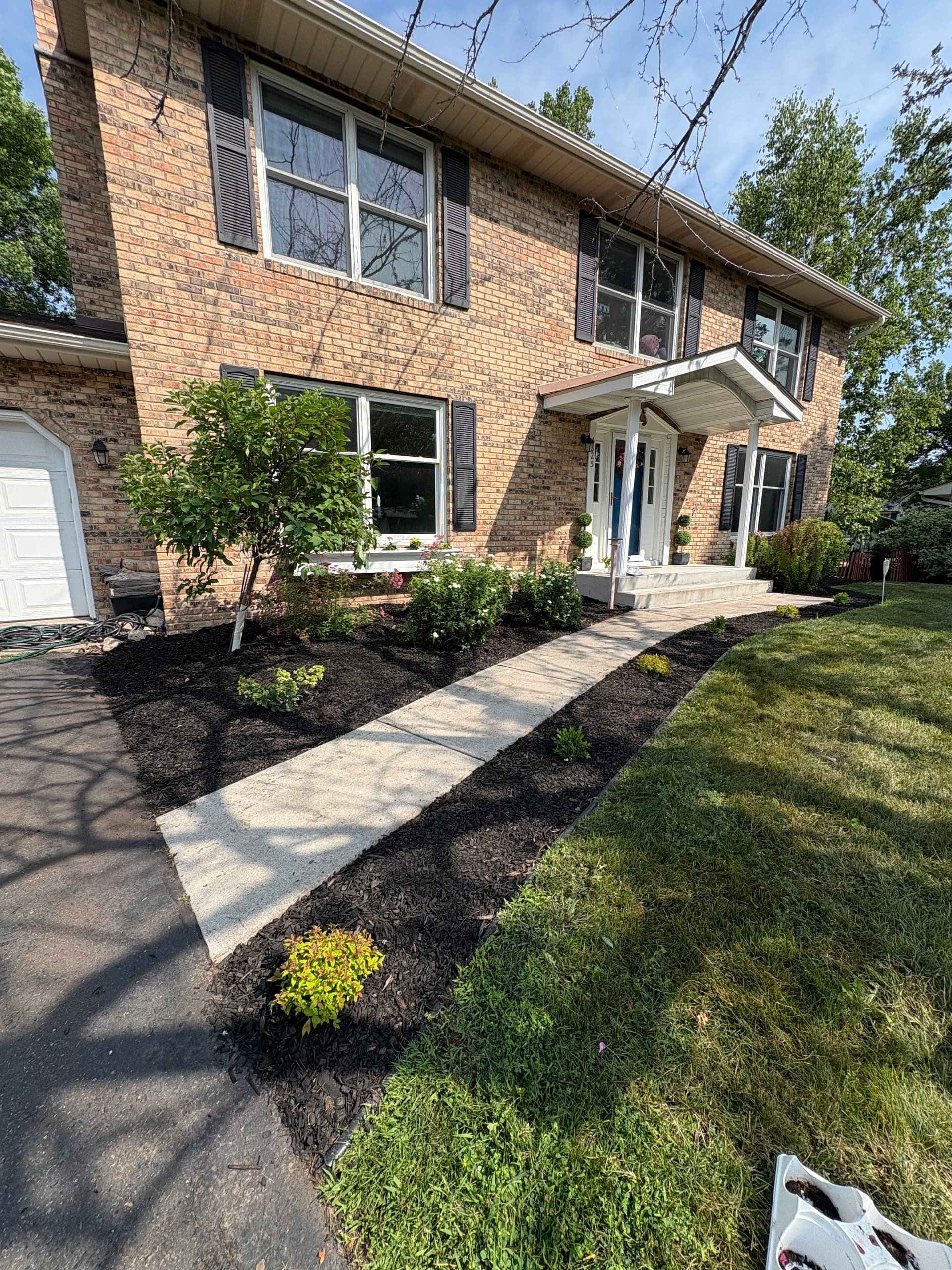Gallery photos for Fresh Mulch and New Plantings That Actually Boost Curb Appeal: Image #1