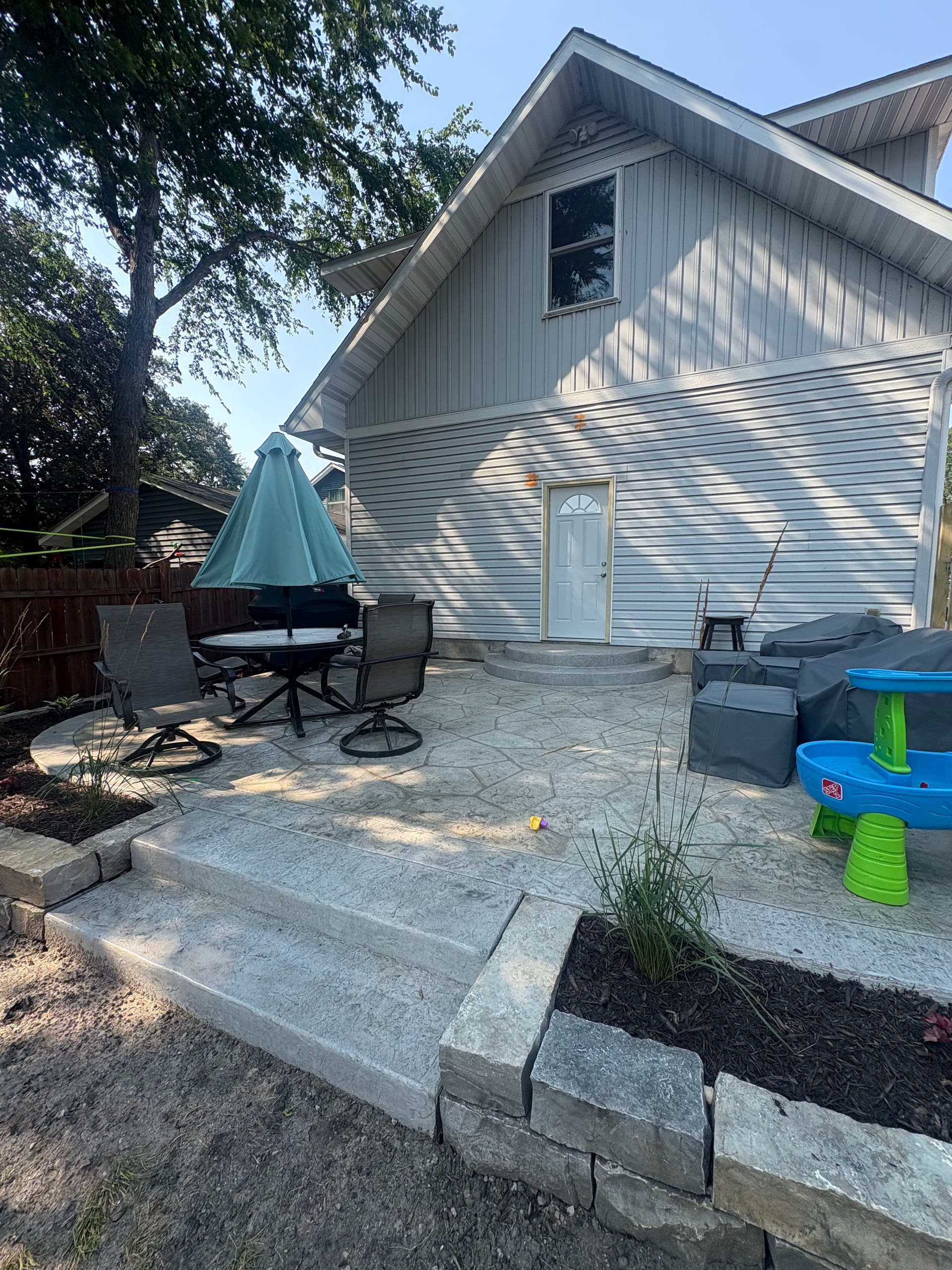 Gallery photos for Stamped Concrete Patio and Chilton Retaining Wall Backyard Build: Image #2