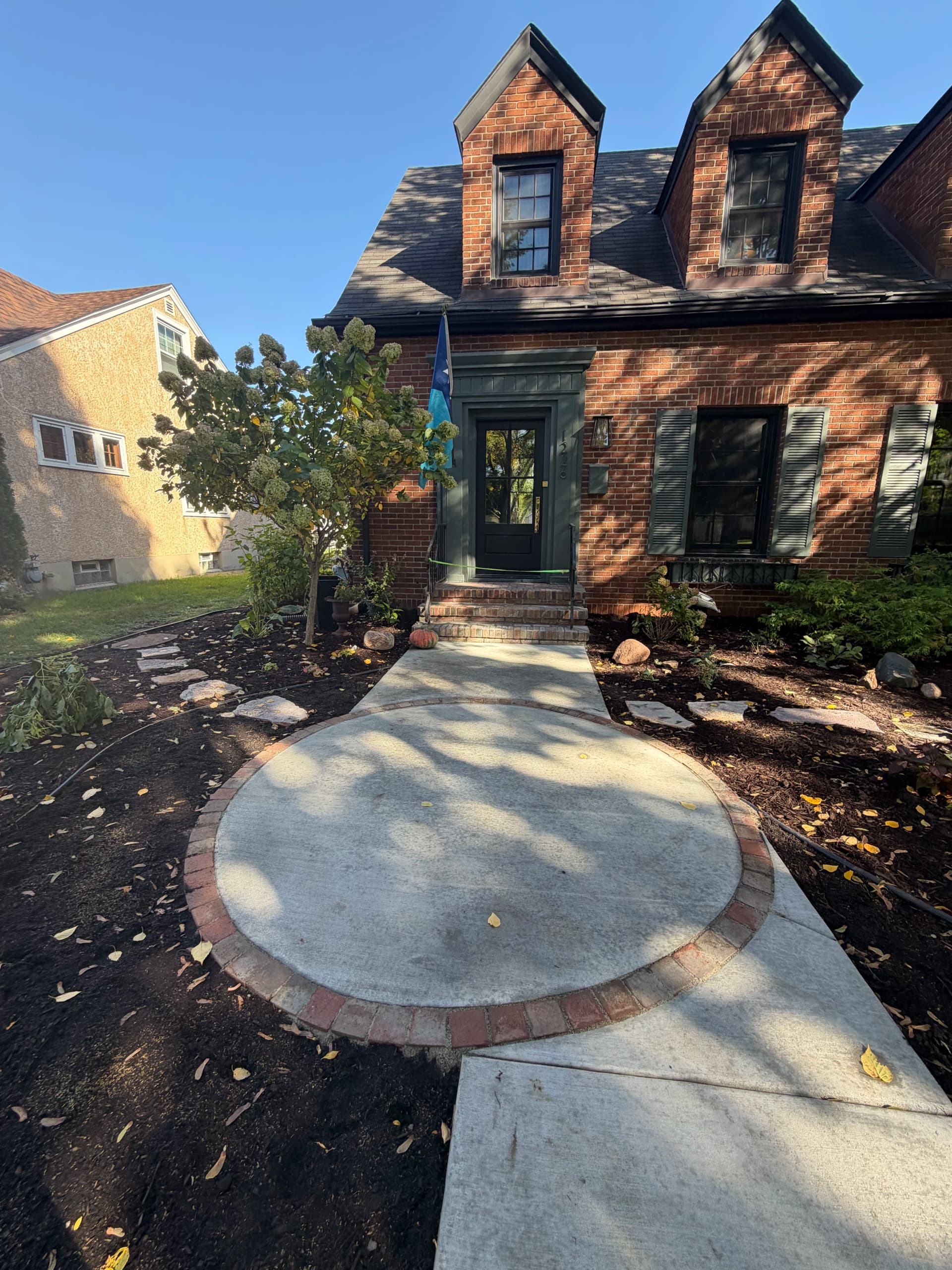 Gallery photos for Front Yard Landscape Design with Granite Patio and Brick Edging: Image #5