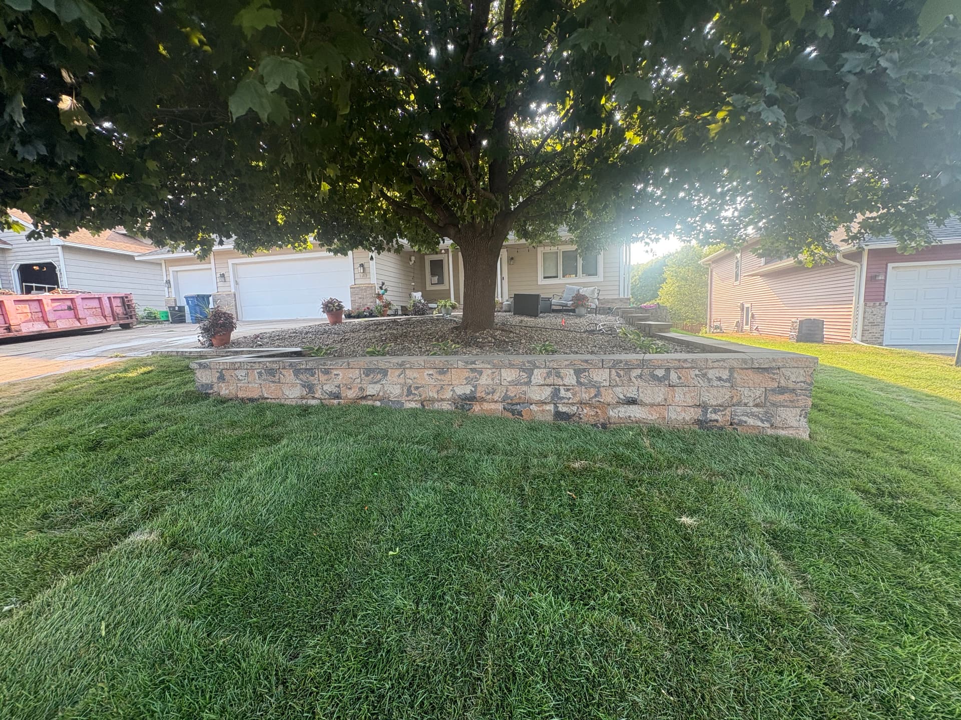 Belgrade Front Yard Retaining Wall Sod and River Rock Install