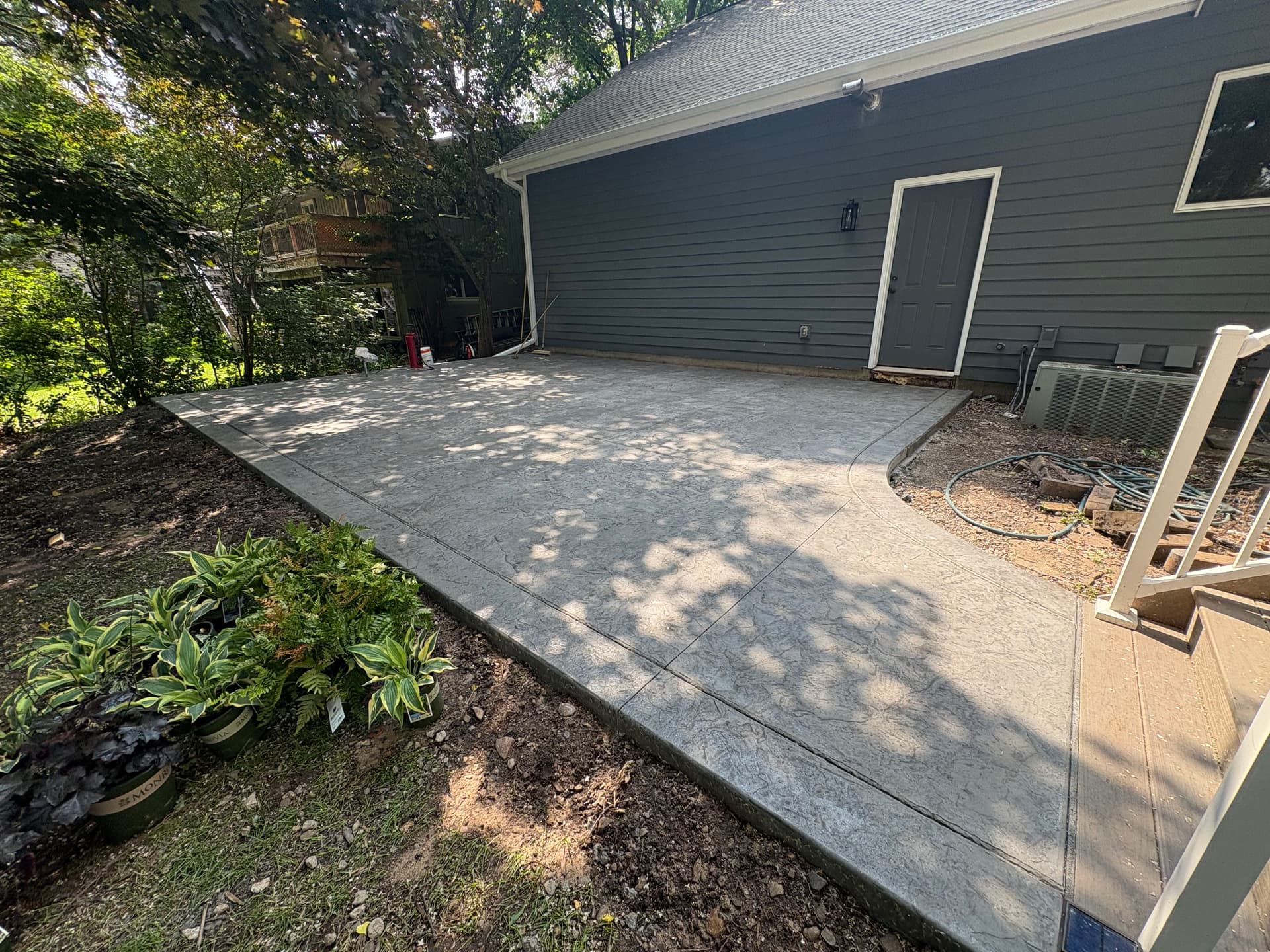 Stamped and Stained Concrete Patio for Hutub image