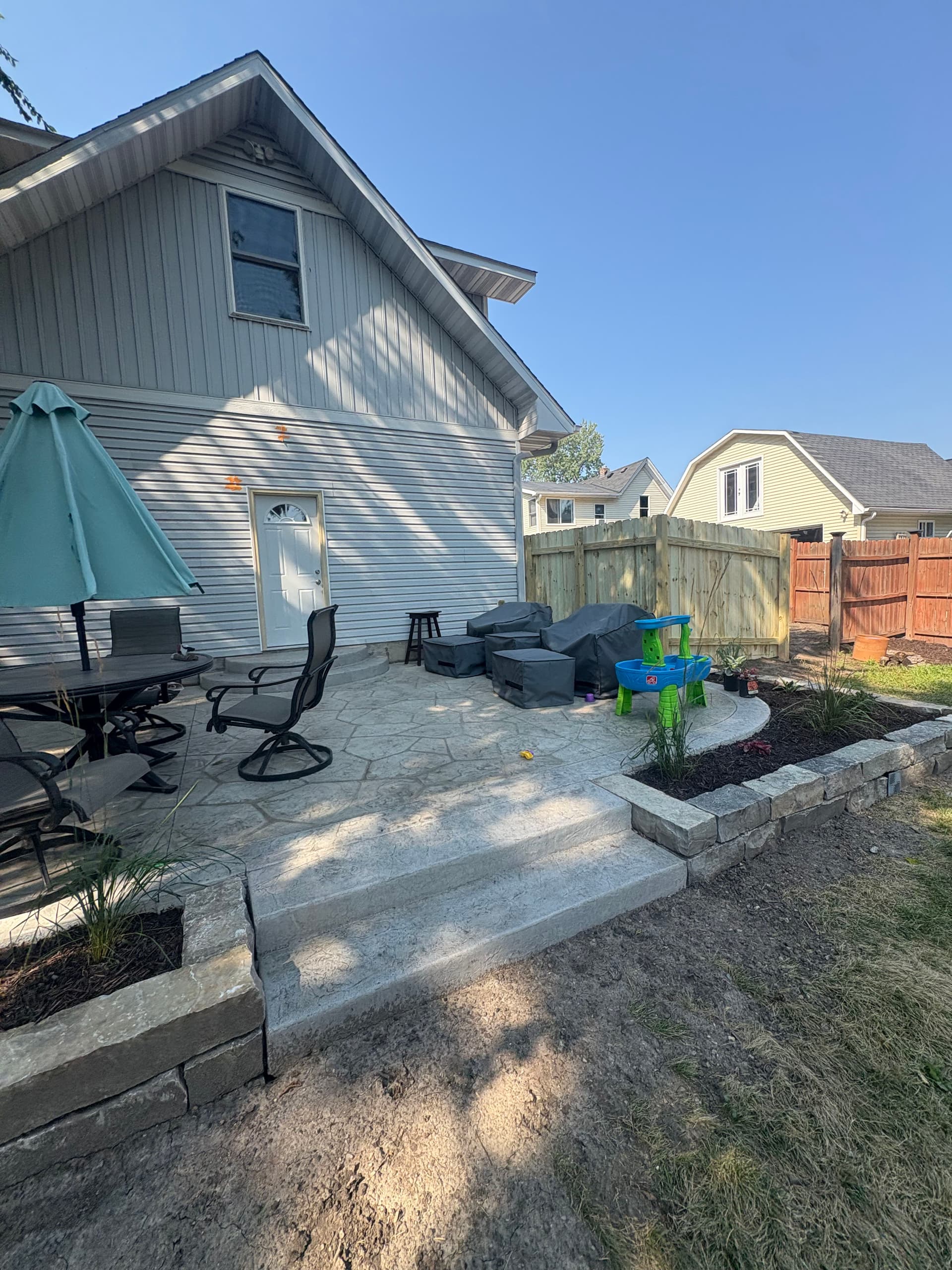 Gallery photos for Stamped Concrete Patio and Chilton Retaining Wall Backyard Build: Image #3