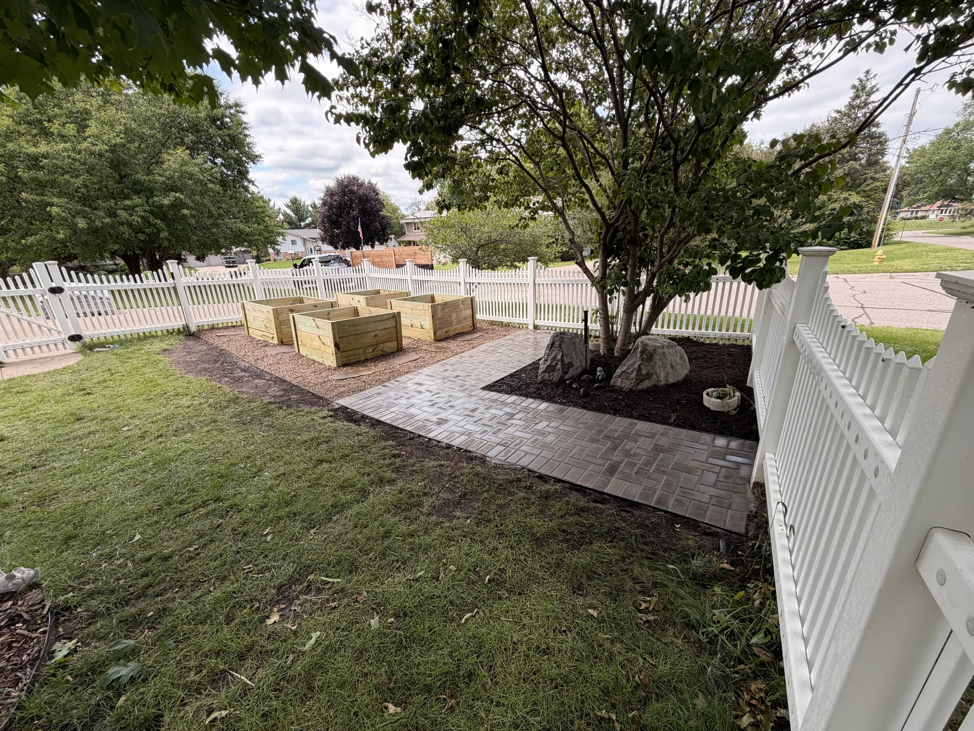 Gallery photos for Paver Walkway and Custom Planter Boxes Turn a Backyard Into a Garden Space: Image #2