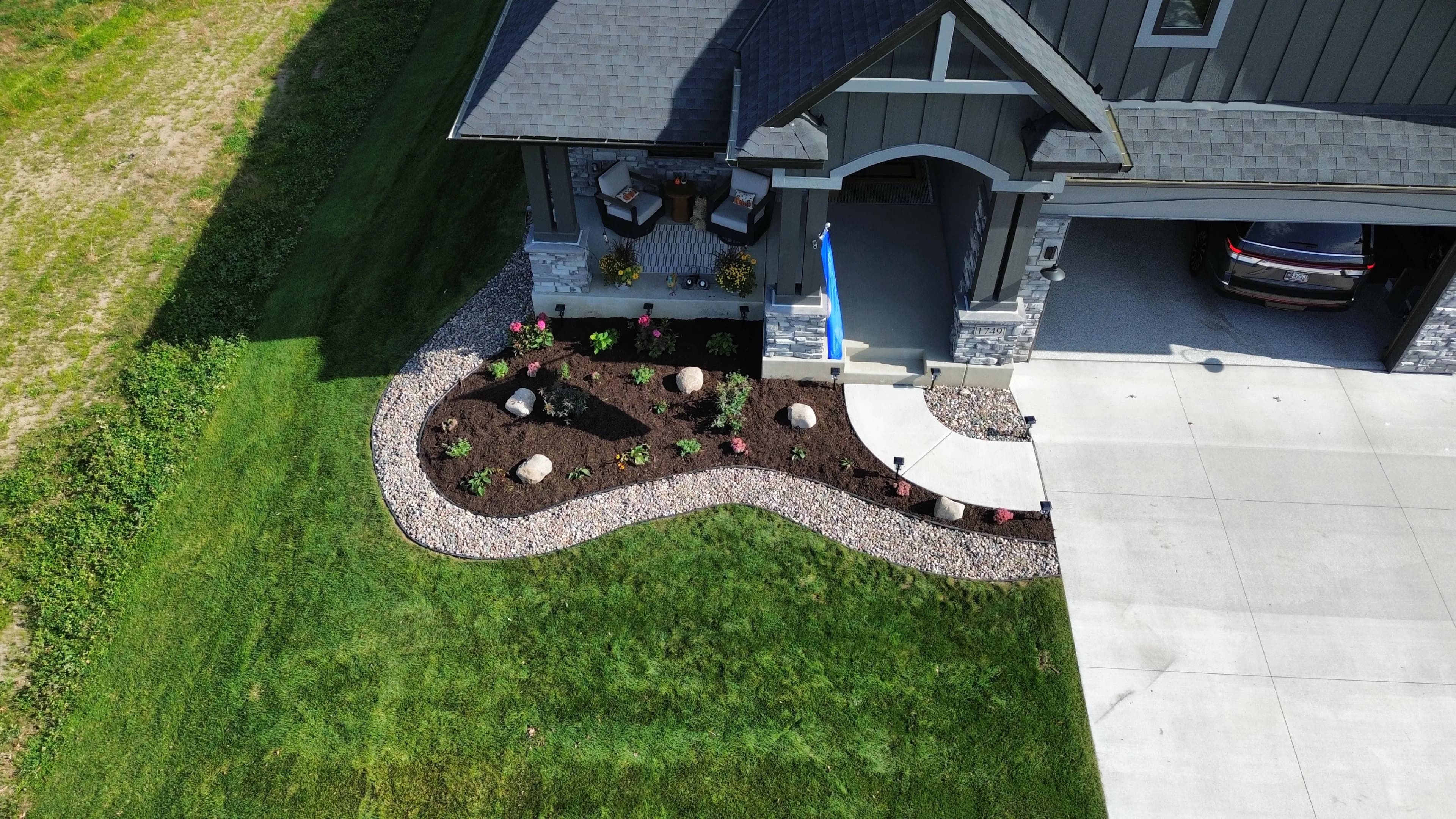 Project Rock, Mulch, and New Plantings That Actually Cut Down on Yard Work image
