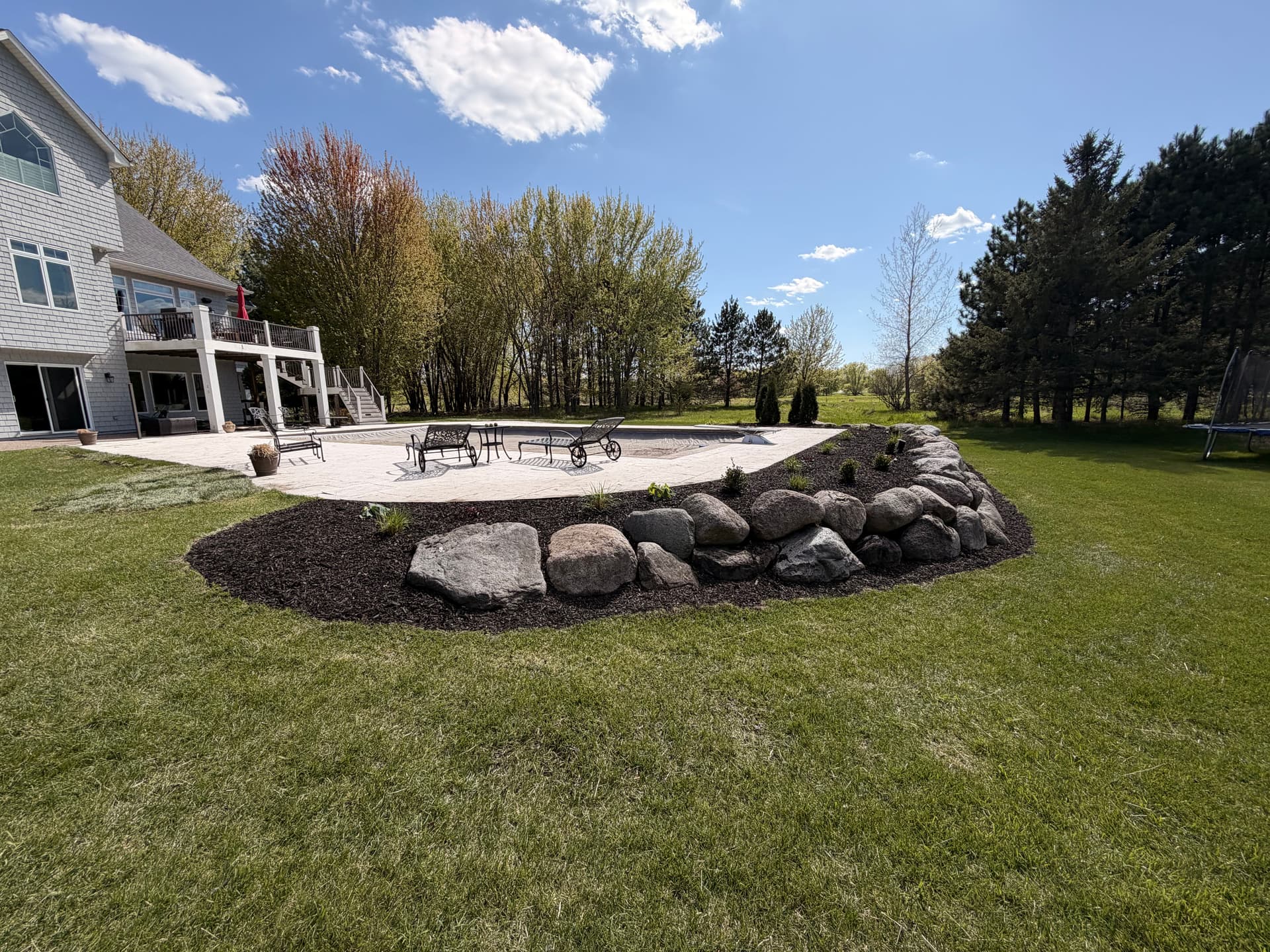 Gallery photos for Pool Area Landscape Redesign with New Plantings and Black Mulch: Image #4