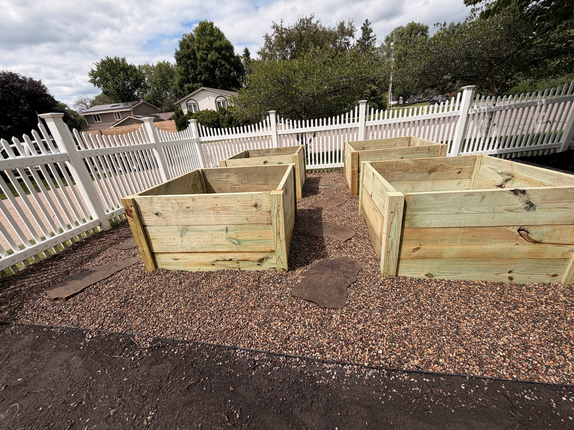 Gallery photos for Paver Walkway and Custom Planter Boxes Turn a Backyard Into a Garden Space: Image #3
