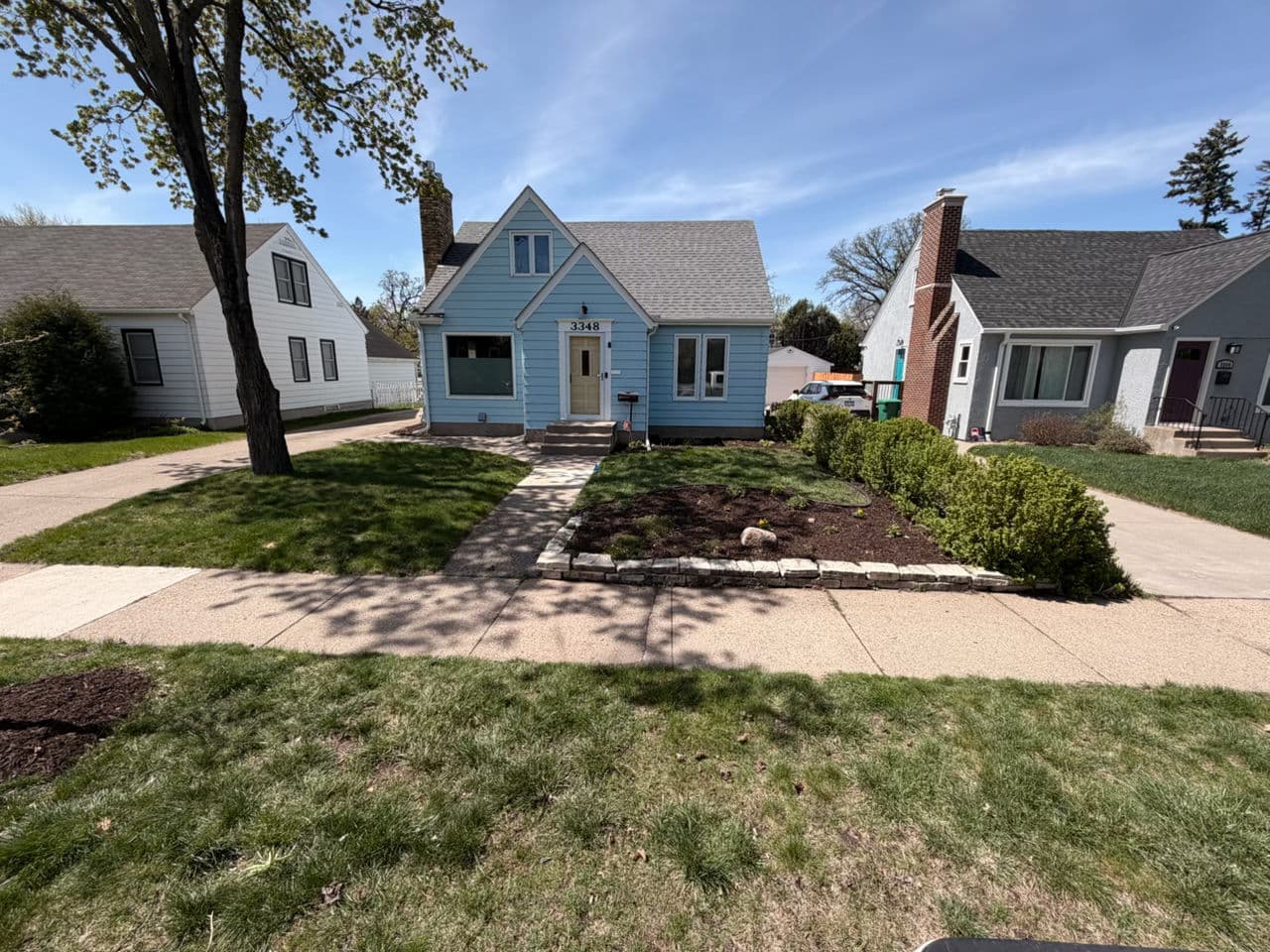 Front Yard Bed Planting With Fresh Mulch and Perennial Color image