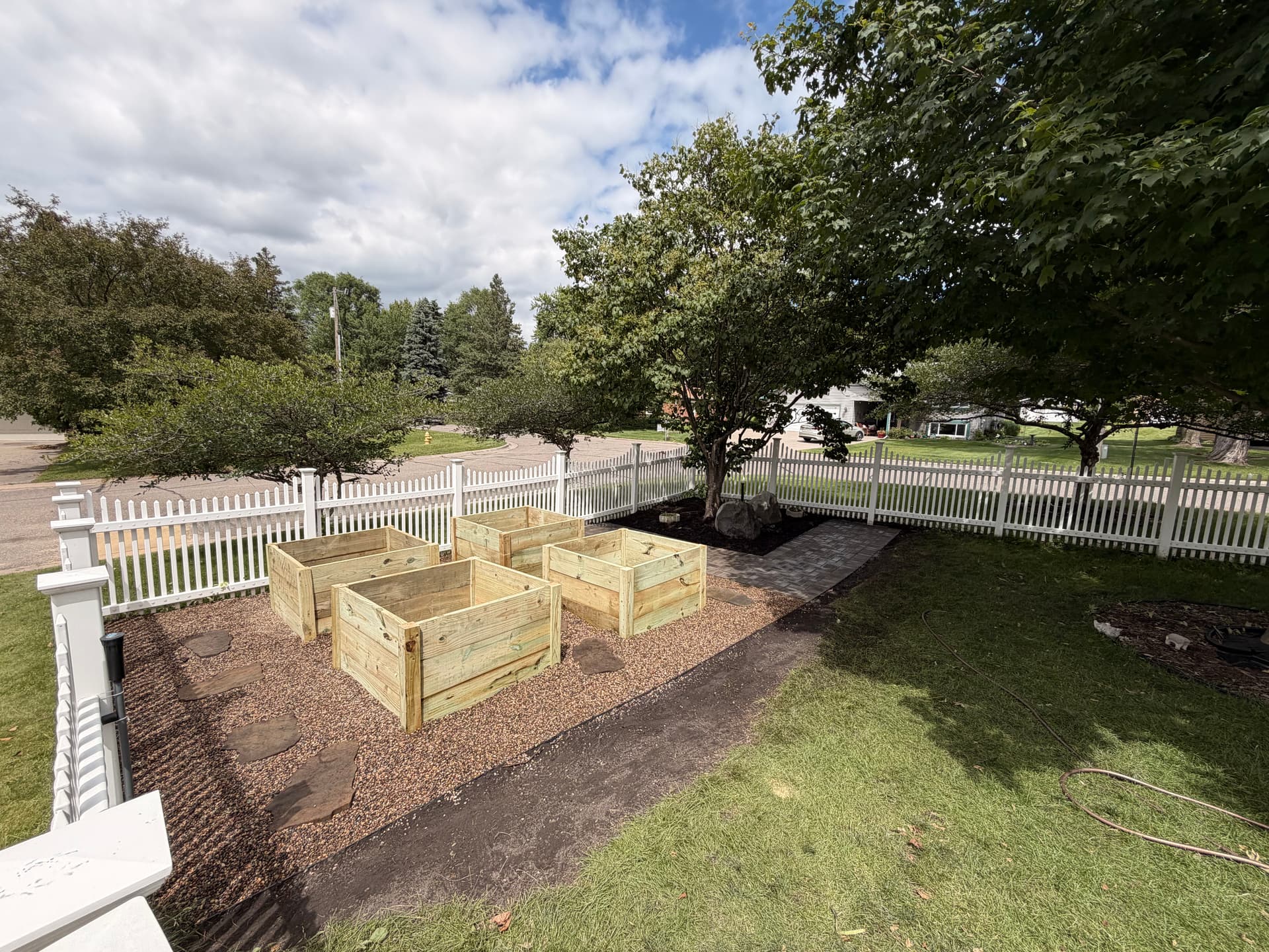 Gallery photos for Paver Walkway and Custom Planter Boxes Turn a Backyard Into a Garden Space: Image #1