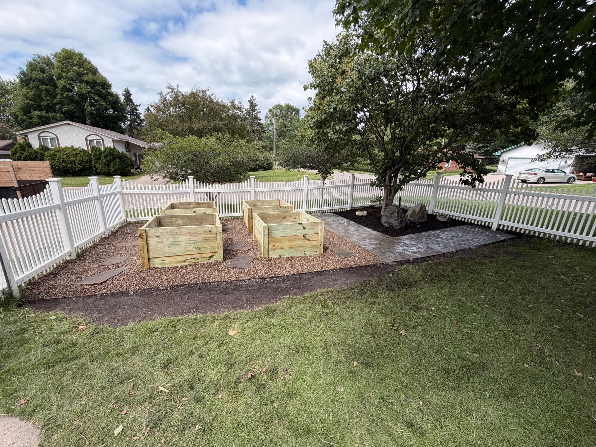 Gallery photos for Paver Walkway and Custom Planter Boxes Turn a Backyard Into a Garden Space: Image #4