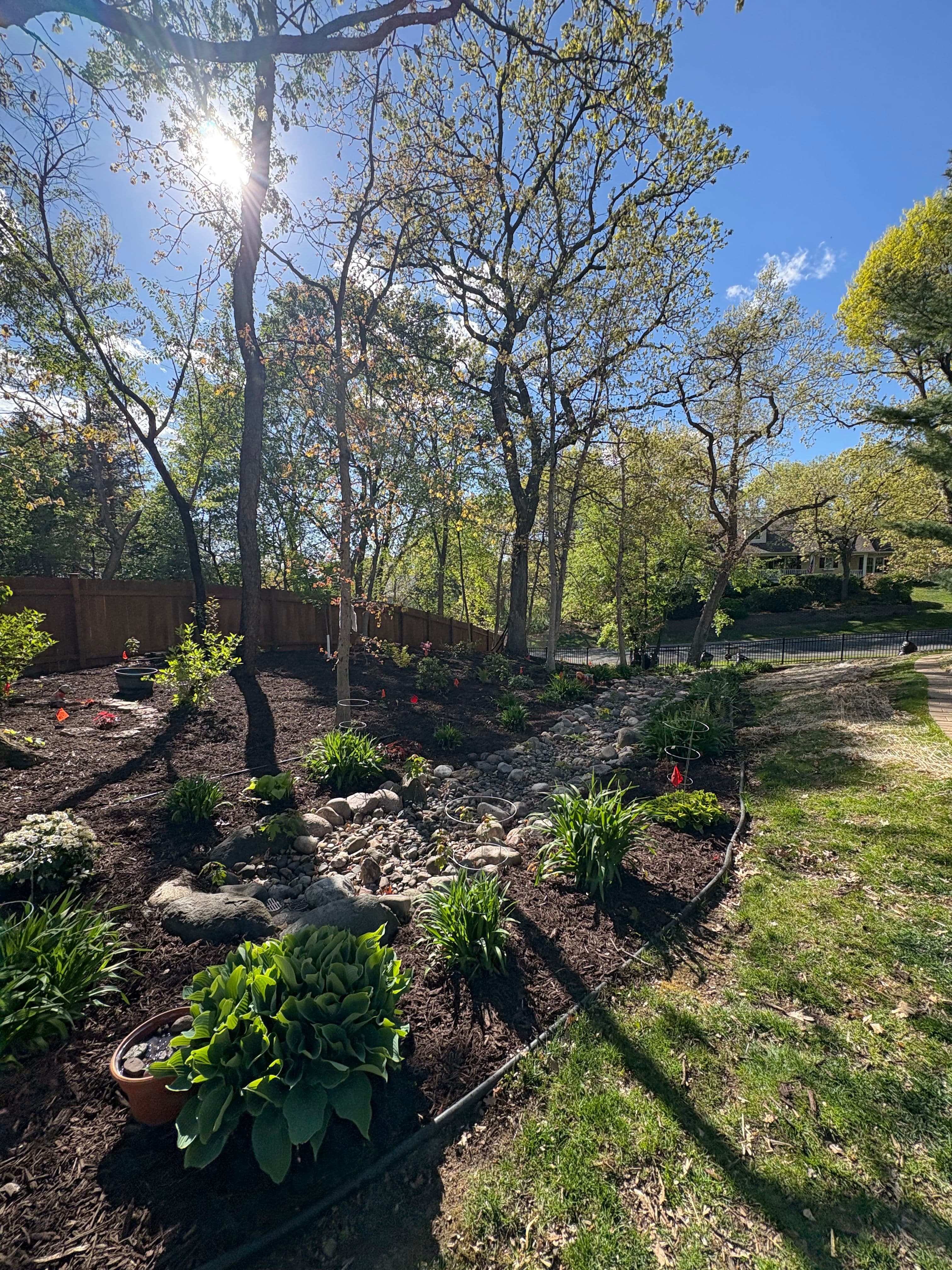 Project Chocolate Brown Mulch and Rock Installation in Hudson image