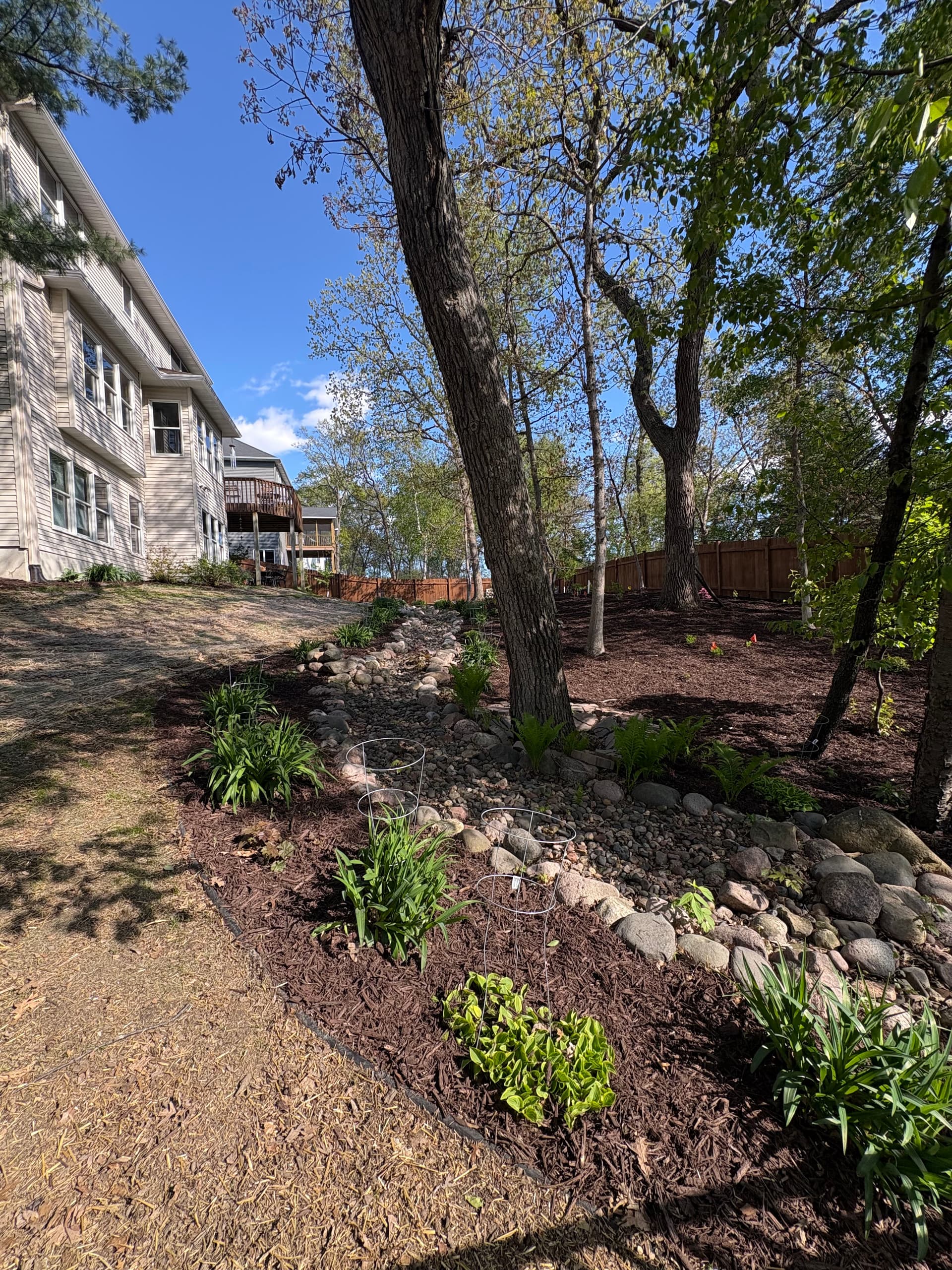 Gallery photos for Chocolate Brown Mulch and Rock Installation in Hudson: Image #2