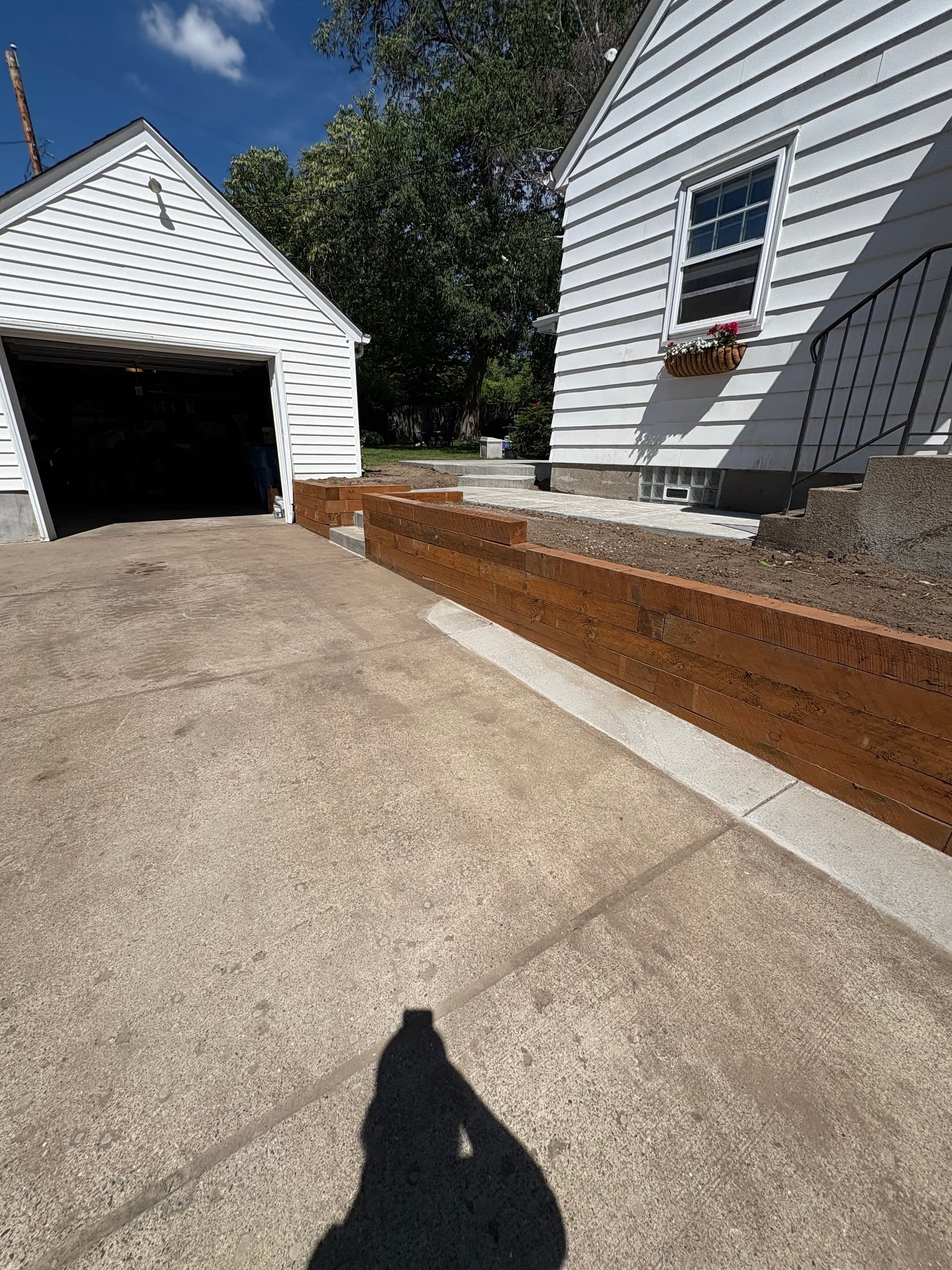 Gallery photos for Cedar Retaining Wall and Full Concrete Hardscape Rebuild: Image #1