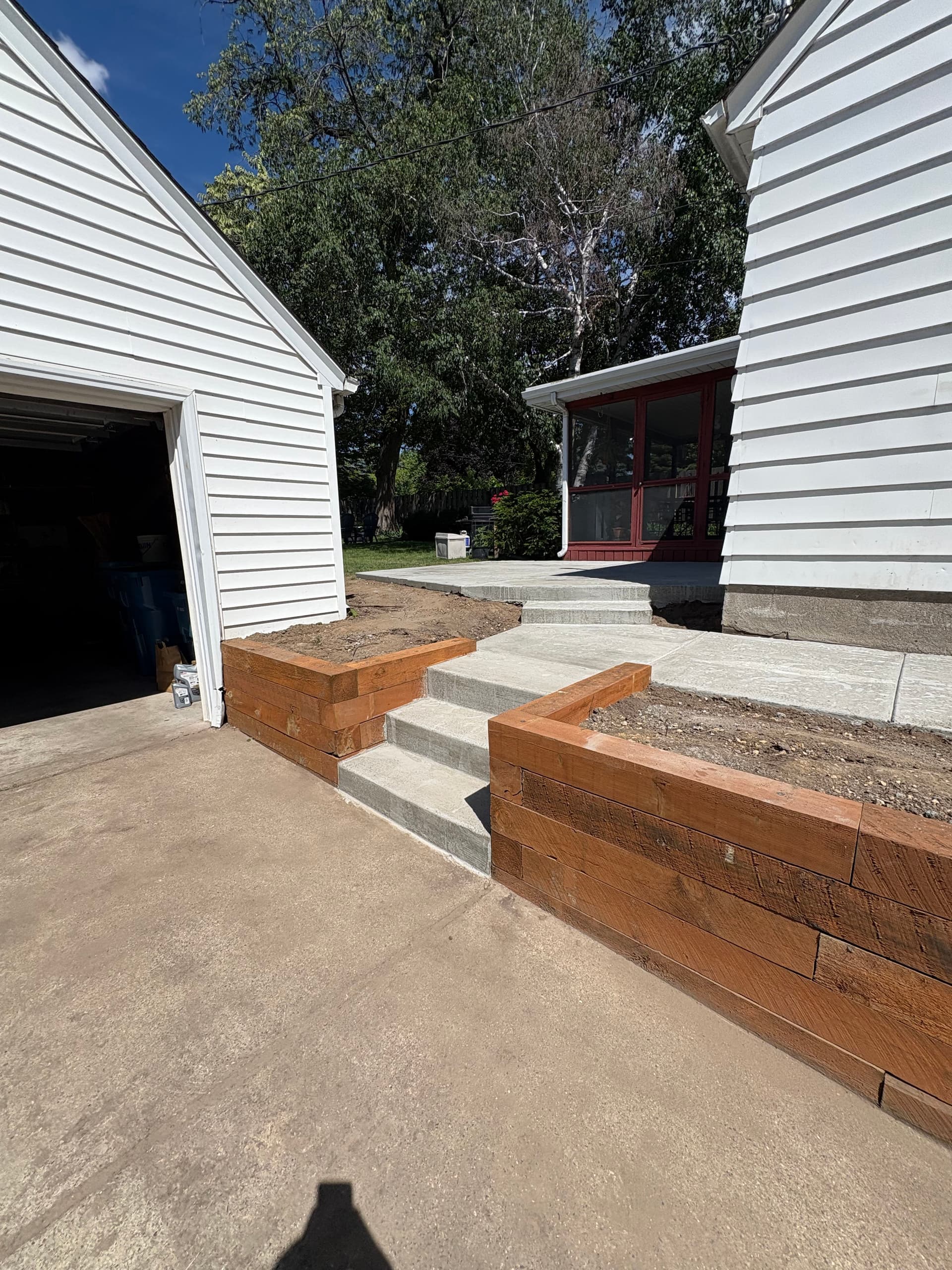 Cedar Retaining Wall and Full Concrete Hardscape Rebuild image