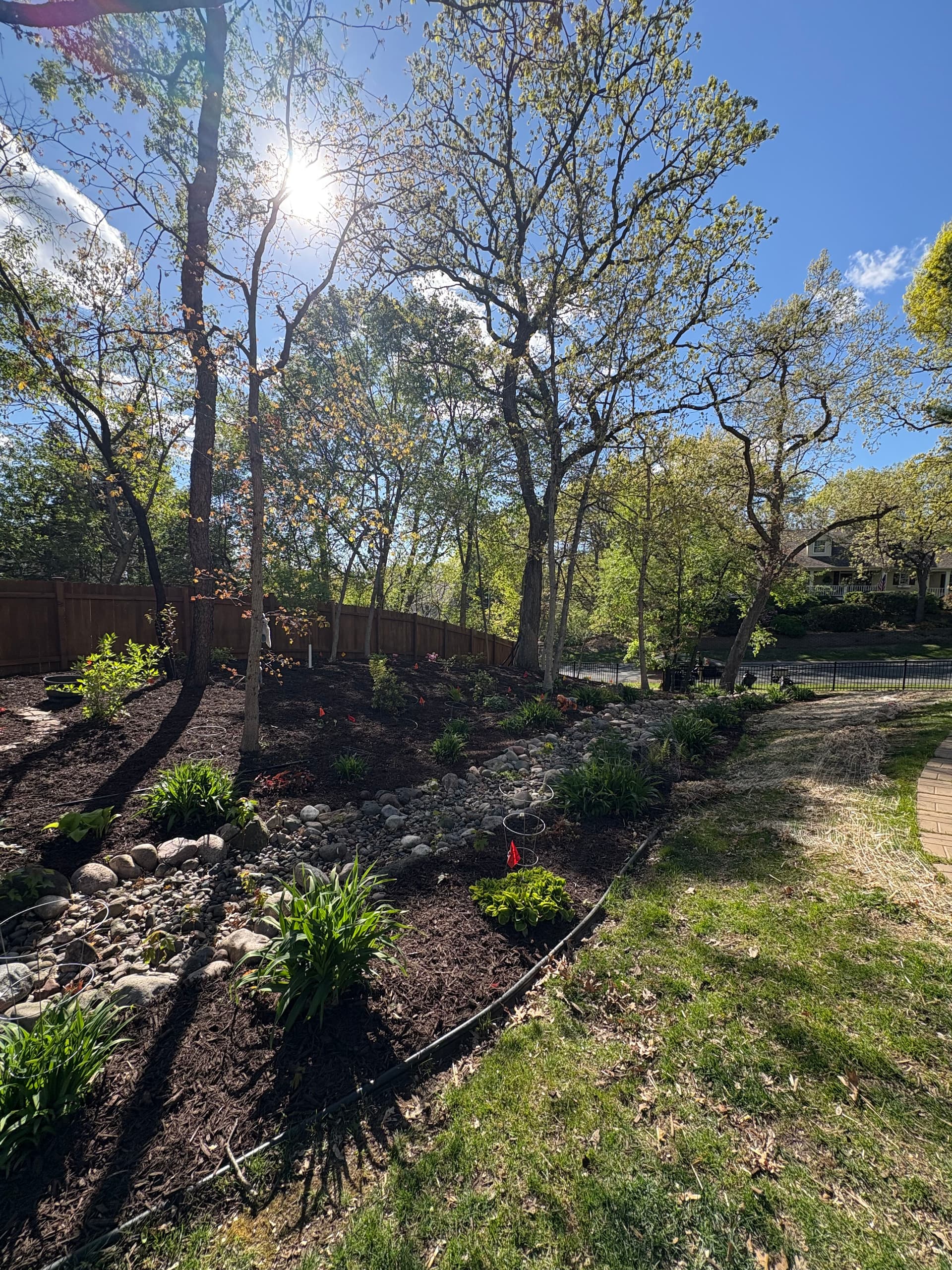Gallery photos for Chocolate Brown Mulch and Rock Installation in Hudson: Image #5