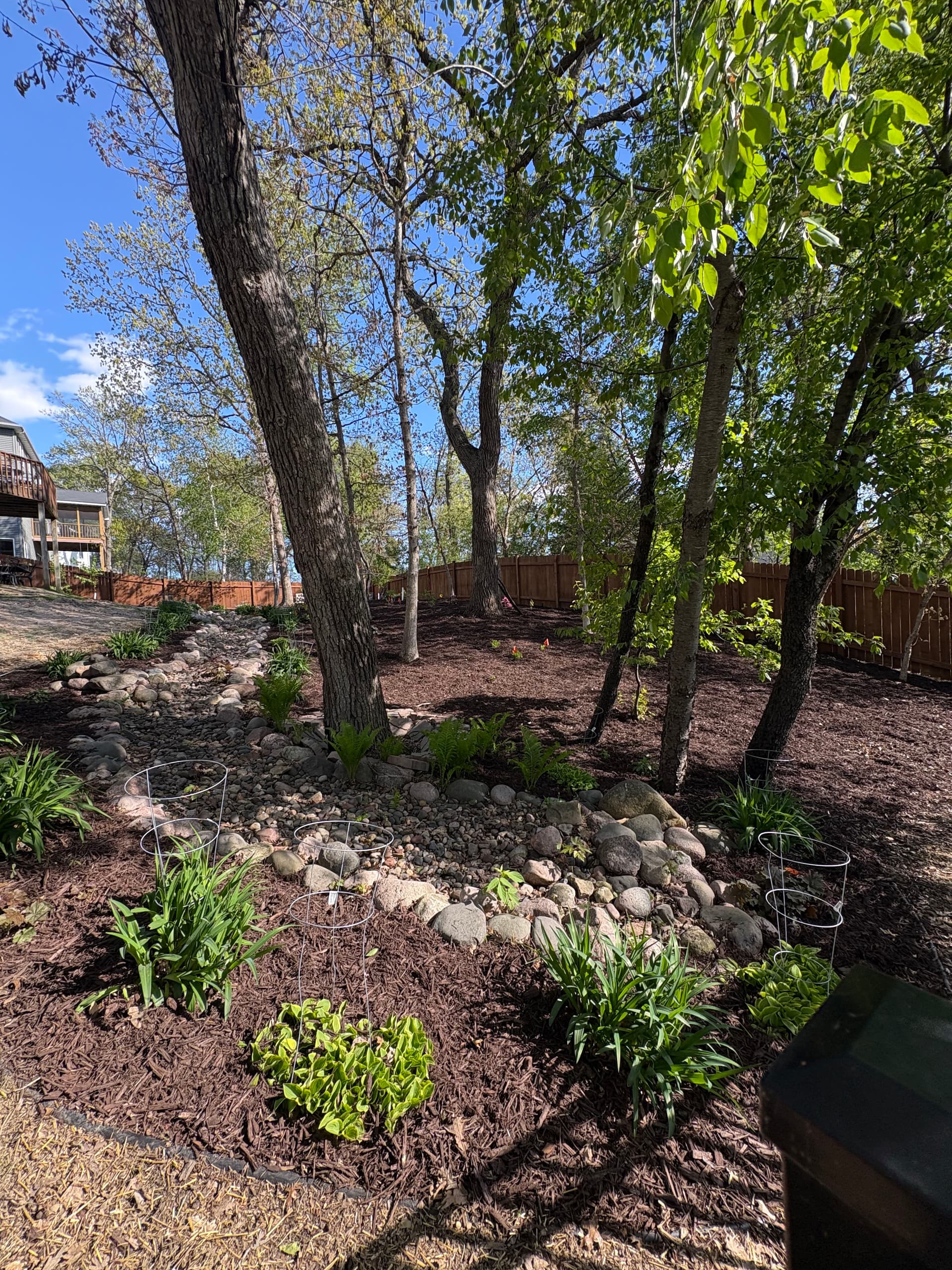 Gallery photos for Chocolate Brown Mulch and Rock Installation in Hudson: Image #3