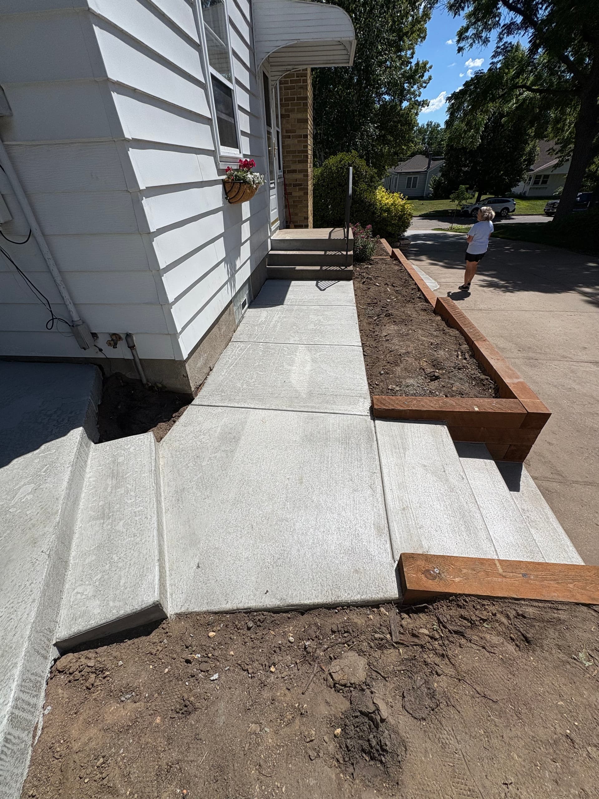 Gallery photos for Cedar Retaining Wall and Full Concrete Hardscape Rebuild: Image #3